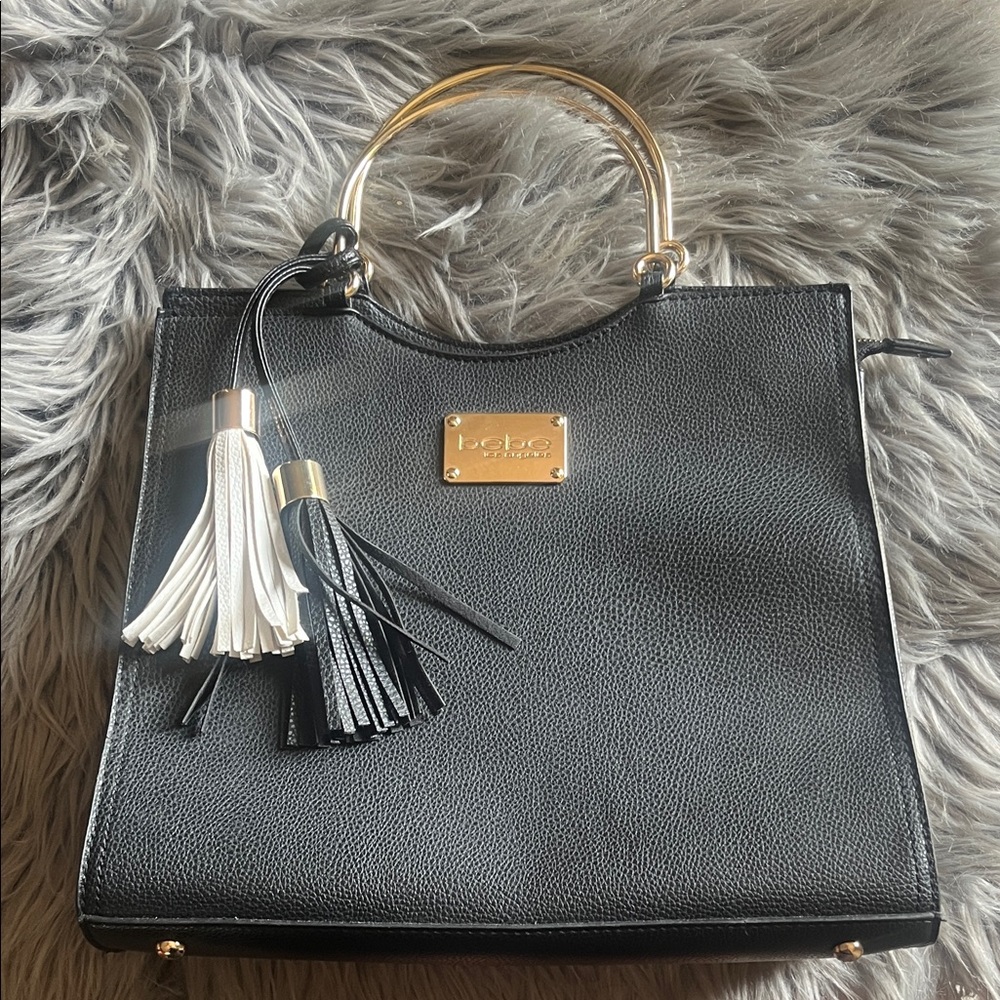 bebe Black Tote with Gold Handles and Tassels